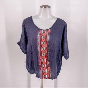 Harper blue top with orange embroidery